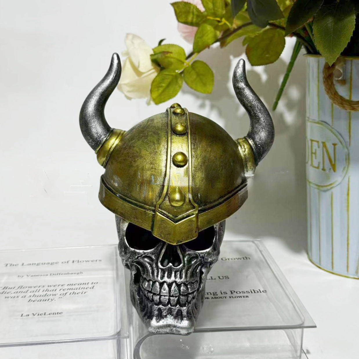 Decorative helmet holder with skull made of synthetic resin
