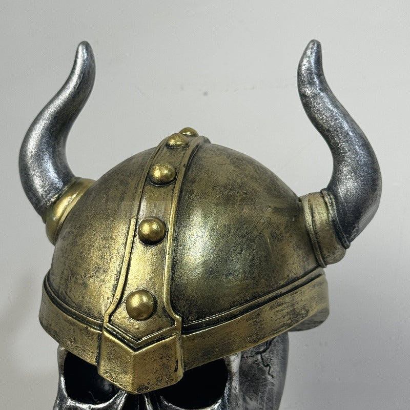 Decorative helmet holder with skull made of synthetic resin
