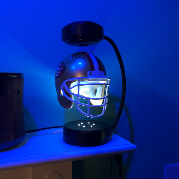 NFL Rotating Levitating Hover Helmet With LED Lighting & Hover Football With Bluetooth Speaker